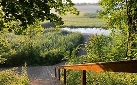 Pustelnia Supraśl - domki nad rzeką